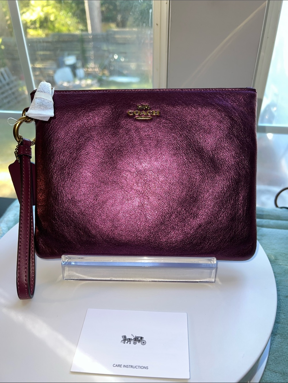 Coach Metallic Plum Leather Wristlet with Gold Hardware